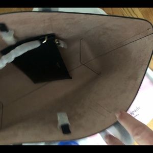Black Kate Spade leather tote with zippered purse inside